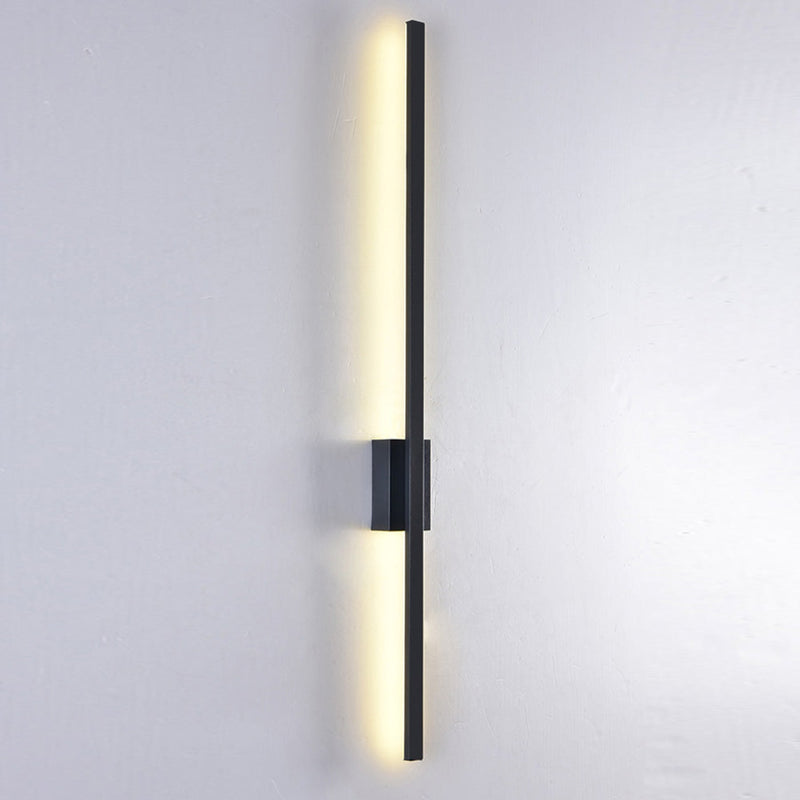 Minimalist Metal Linear Wall Light With Warm LED Glow in Black — James New York