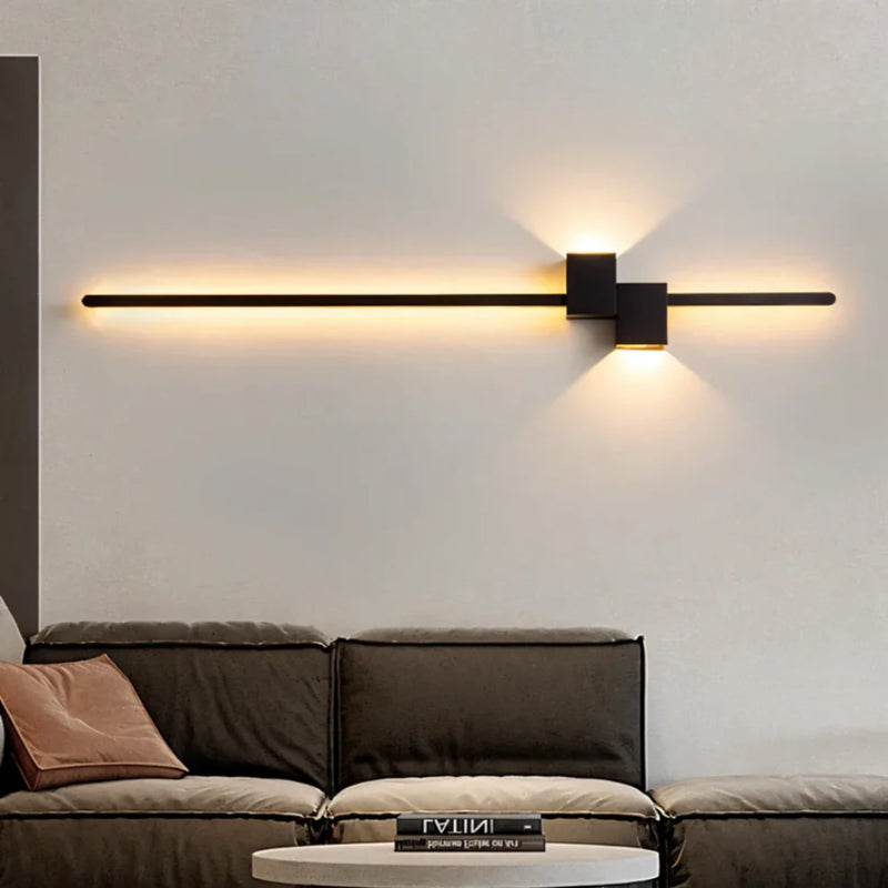 Modern Metal LED Wall Light With Warm Glow in Black — James New York