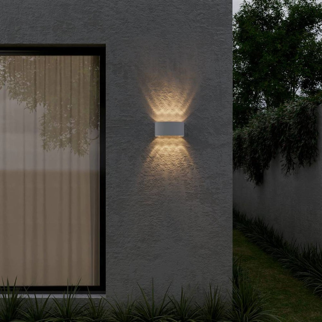 Minimalist Aluminum Wall Light With Warm LED Glow — James New York
